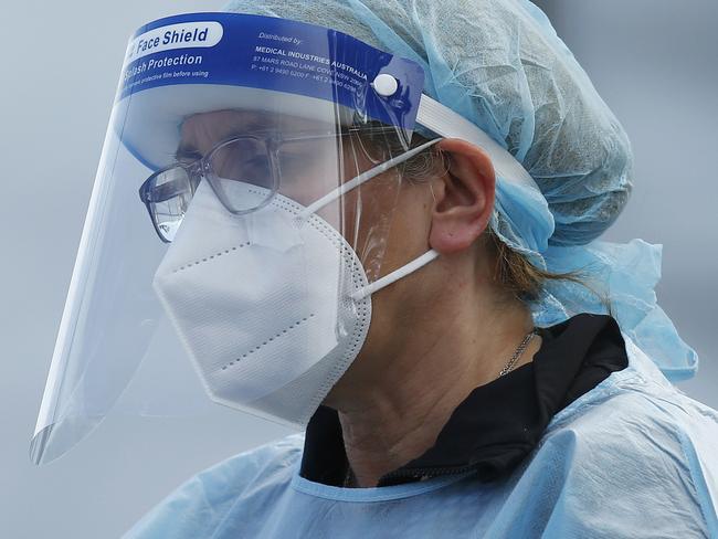 MELBOURNE, AUSTRALIA - NewsWire Photos SEPTEMBER 18, 2020:   Health workers are seen in full PPE at a pop-up COVID19 test site in Clyde, Melbourne, Victoria. Picture: NCA NewsWire / Daniel Pockett