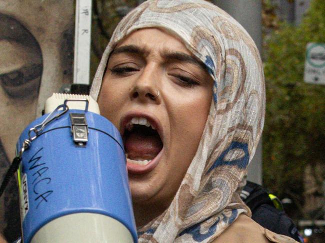 MELBOURNE, AUSTRALIA - NewsWire Photos - 26 APRIL, 2024: Pro-trans activists clash with members of Victoria Police. Picture: NewsWire / Diego Fedele