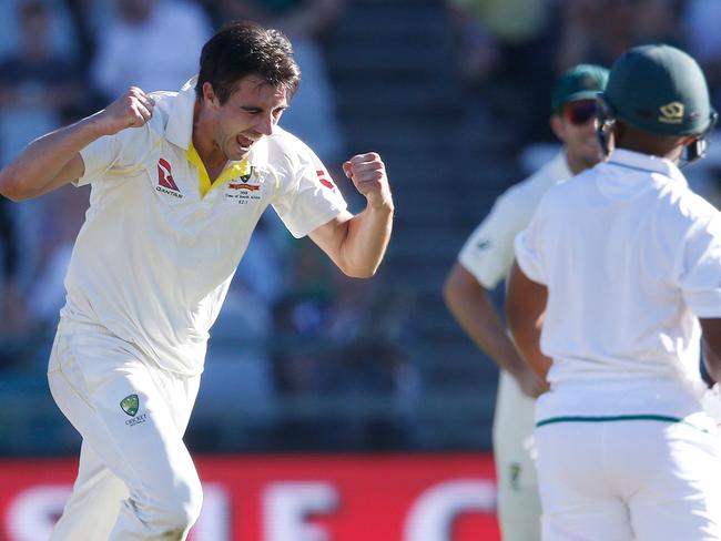 Australian bowler Pat Cummins celebrates the dismissal of South African batsman Temba Bavuma in the third Test.