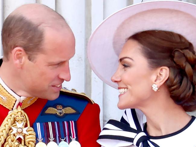 LONDON, ENGLAND - JUNE 15: Prince William, Prince of Wales and Catherine, Princess of Wales on the balcony during Trooping the Colour at Buckingham Palace on June 15, 2024 in London, England. Trooping the Colour is a ceremonial parade celebrating the official birthday of the British Monarch. The event features over 1,400 soldiers and officers, accompanied by 200 horses. More than 400 musicians from ten different bands and Corps of Drums march and perform in perfect harmony. (Photo by Chris Jackson/Getty Images)