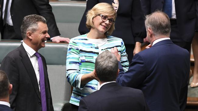 Warringah independent Zali Steggall, centre, is congratulated by Opposition Leader Anthony Albanese, right, after delivering her maiden speech yesterday. Picture: AAP