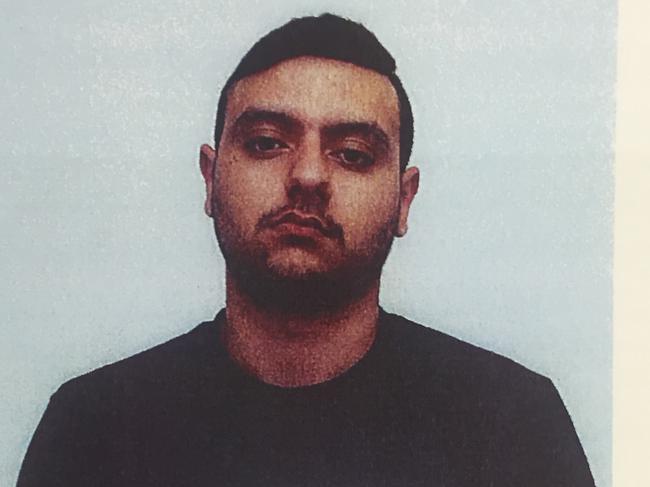 SUNDAY TELEGRAPH SPECIAL. MUST NOT BE PUBLISHED WITHOUT TALKING WITH CLARE HARVEY, YONI BASHAN OR JEFF DARMANIN Jamil Qaumi, youngest of the Qaumi brothers, following his arrest on November 8, 2013. Police mugshot.