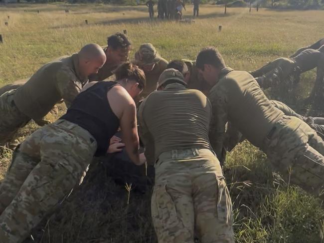 Townsville Bulletin journalist, Jami Roberts does push ups with the 3rd Battalion, Royal Australian Regiment (3RAR). 9 May 2025