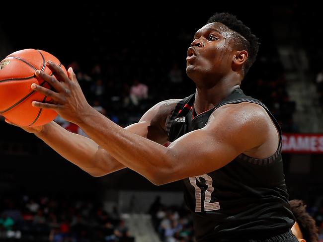 ATLANTA, GA - MARCH 28: Zion Williamson #12 of Spartanburg Day School attacks the basket against Jordan Brown #21 of Prolific Prep during the 2018 McDonald's All American Game at Philips Arena on March 28, 2018 in Atlanta, Georgia. (Photo by Kevin C. Cox/Getty Images)