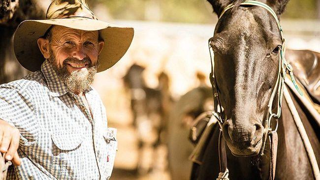 Bruce Mayne with one of his many horses. Photo Contributed / Rockhampton Morning Bulletin