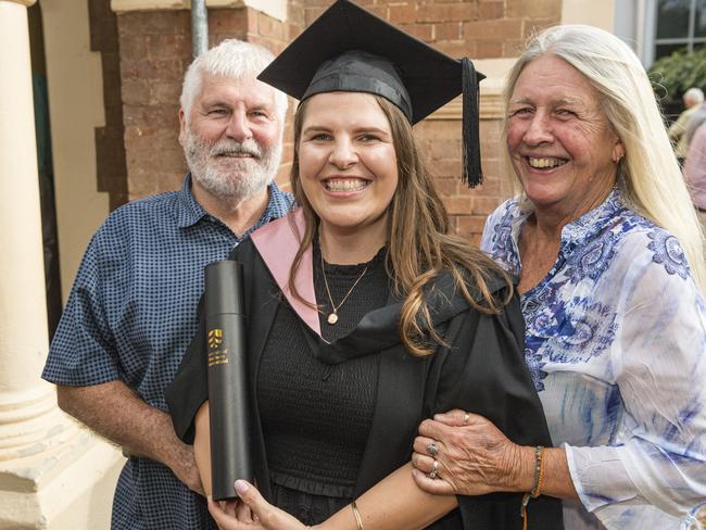 Bachelor of Education (Primary) graduate Jaclyn Carson with Neil and Katherene Rowlands at a UniSQ graduation ceremony at Empire Theatres, Tuesday, February 13, 2024. Picture: Kevin Farmer