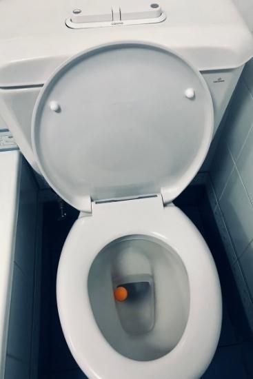 Ping pong ball helps stop boys from missing the toilet