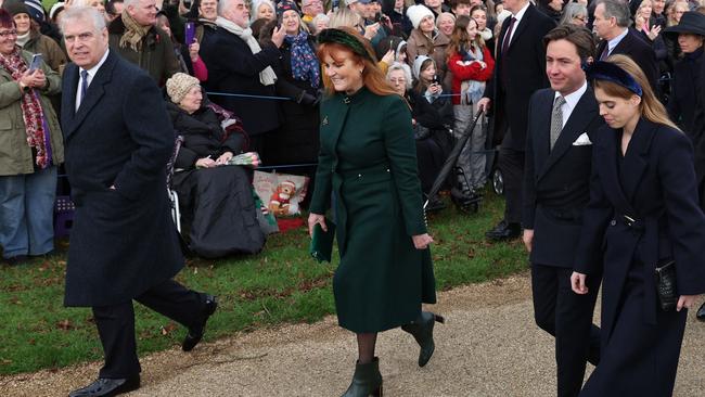 Prince Andrew, Duke of York (L), Sarah, Duchess of York (2L) Edoardo Mapelli Mozzi (2R) and Princess Beatrice of York (R) arrive for the Royal Family's traditional Christmas Day service at St Mary Magdalene Church in Sandringham. Picture: AFP.