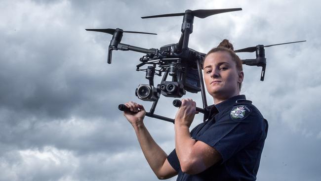 Acting Sergeant Brooke Tolley with a DJI Matrice drone. Picture: Jake Nowakowski