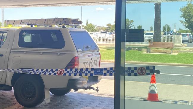 The scene after two cars hit the Dubbo Airport doors on Tuesday morning.