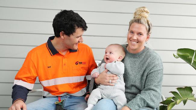 Mount Torley Warkworth senior mine geologist Nathaniel Skliros, who is based at Branxton in the lower Hunter Vally, with his wife Sophie and four-month-old son Harvey. Picture: Rohan Kelly