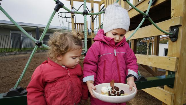 Lacey, 19 months, and her sister Milla, 3, contemplate the Shoreline Hotel’s Kids Brownie.