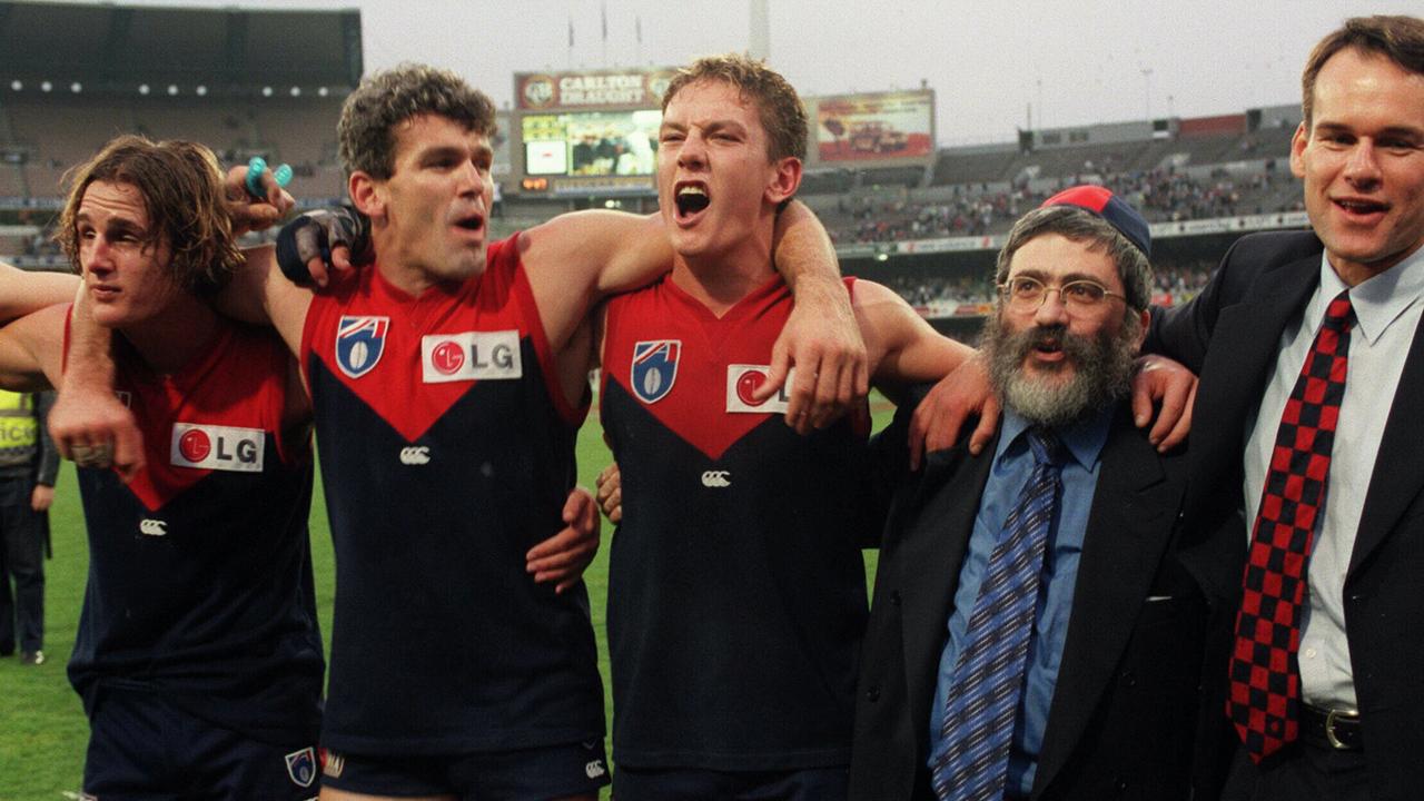 Shaun Smith (second left) has hit out at Melbourne’s fitness department. 