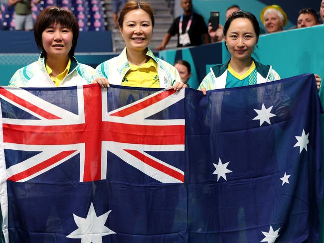 PARIS, FRANCE - AUGUST 31: Li Na Lei (C) and Qian Yang (L) of Team Australia celebrate winning the gold medals after their victory against Tzu Yu Lin and Shiau Wen Tian of team Chinese Taipei in the Women's Doubles - WD20 Gold medal match on day three of the Paris 2024 Summer Paralympic Games at South Paris Arena on August 31, 2024 in Paris, France. (Photo by Michael Reaves/Getty Images)