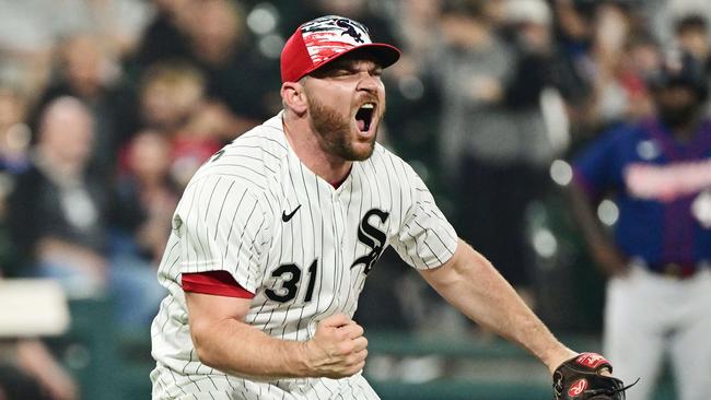 CHICAGO, ILLINOIS - JULY 04: Liam Hendriks #31 of the Chicago White Sox reacts after striking out a batter in the eighth inning against the Minnesota Twins at Guaranteed Rate Field on July 04, 2022 in Chicago, Illinois.   Quinn Harris/Getty Images/AFP == FOR NEWSPAPERS, INTERNET, TELCOS & TELEVISION USE ONLY ==