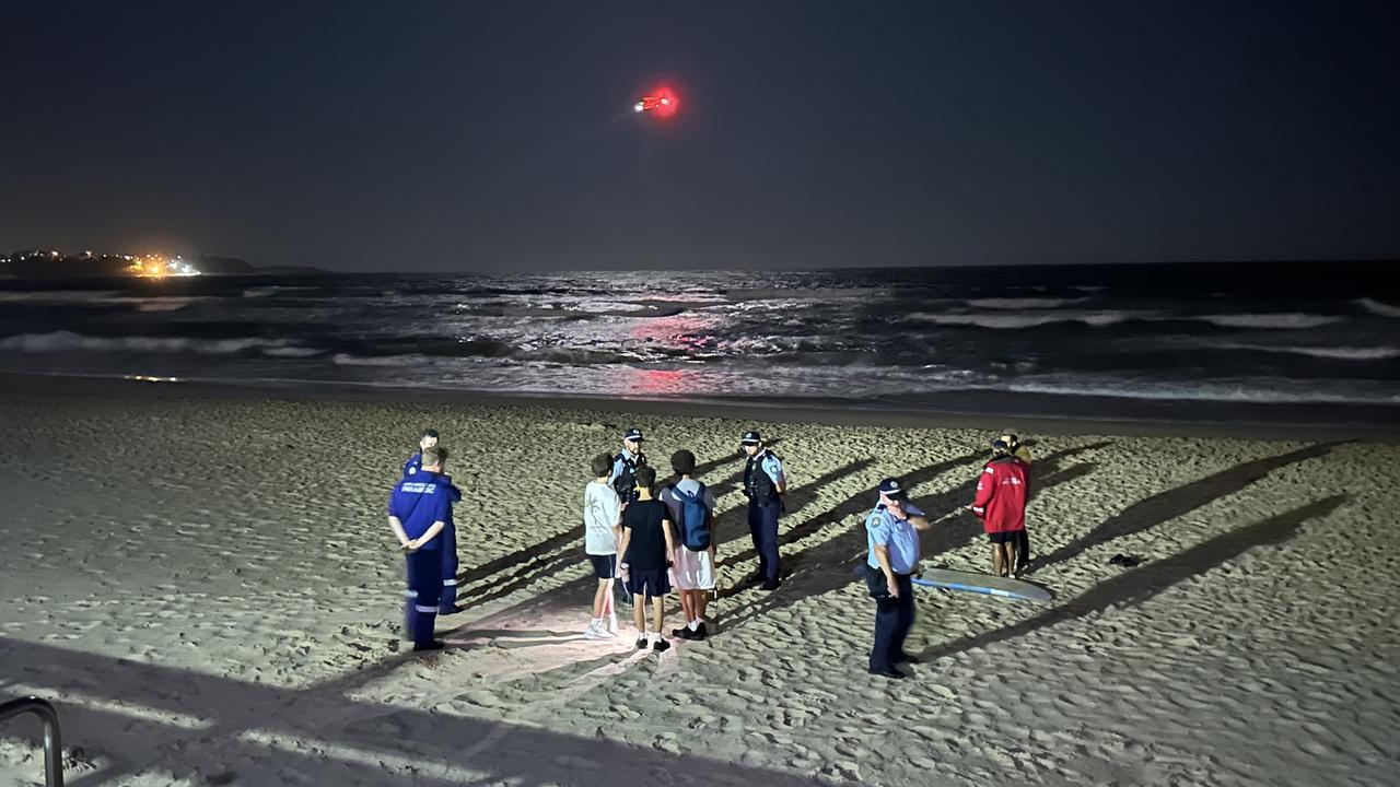 Emergency services combed manly Beach and surrounding waters for any signs of distress after shoes and a surfboard were found on the sand. Picture: Luke Gavahan/ @lukegavahanmedia