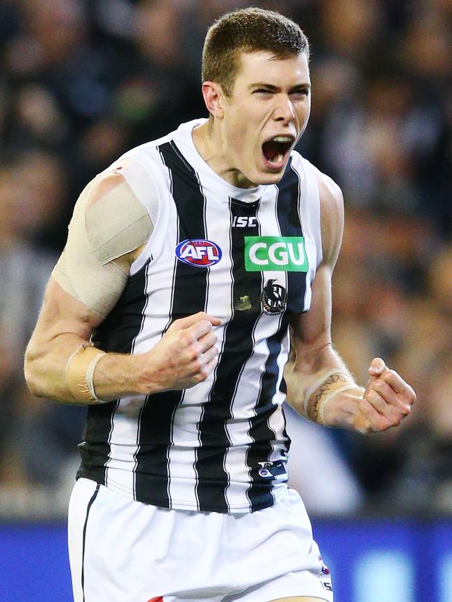 Mason Cox celebrates a goal.