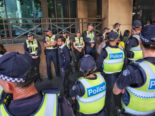 Victorian Police prior to the arrival of Cardinal George Pell at the Melbourne Magistrates Court in Melbourne. Picture: Luis Ascui/AAP