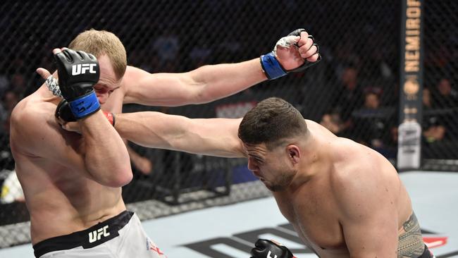 Tuivasa lands a blow on Serghei Spivac during UFC 243 in Melbourne. Picture: Jeff Bottari/Zuffa LLC via Getty Images