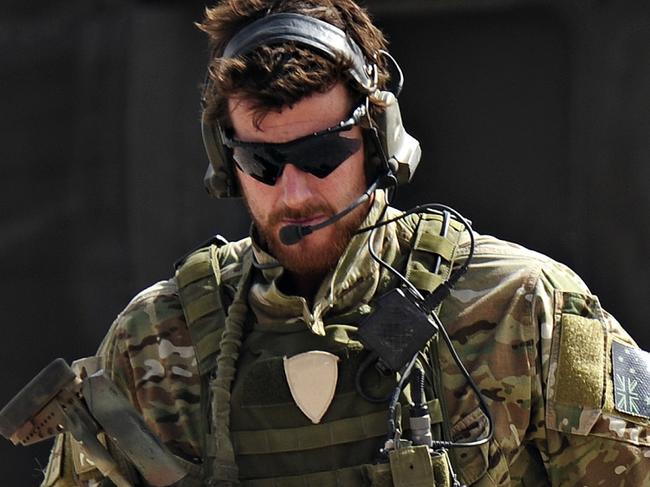 Australian Army soldier Corporal Benjamin Roberts-Smith, VC, MG, with the Special Operations Task Group, moves away from a United States UH-60 Black Hawk helicopter during preparations for the Shah Wali Kot Offensive in southern Afghanistan. *** Local Caption *** In June 2010, Afghan National Security Forces (ANSF) partnered with Australian special forces from the Special Operations Task Group to conduct a deliberate operation to clear a Taliban insurgent stronghold in the Shah Wali Kot region of northern Kandahar province.  The Shah Wali Kot Offensive comprised synchronised and deliberate clearance operations involving Australian commandos combined with a number of surgical helicopter-born assaults from Special Air Service (SAS) troops on key targets.  Removing Taliban insurgents from Afghan communities allows the Government of Afghanistan to establish a presence and gain the trust of the community to provide them with necessary infrastructure and security that was not provided by the insurgents.  The Shah Wali Kot Offensive was part of Australiaâs contribution to Operation Hamkari, an ISAF operation to extend the Government of Afghanistanâs influence into Kandahar City in southern Afghanistan. Picture: Department of Defence