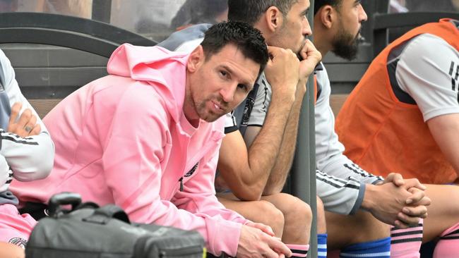 Lionel Messi (L) stayed on the bench for the friendly football match between Hong Kong XI and US Inter Miami CF in Hong Kong. (Photo by Peter PARKS / AFP)