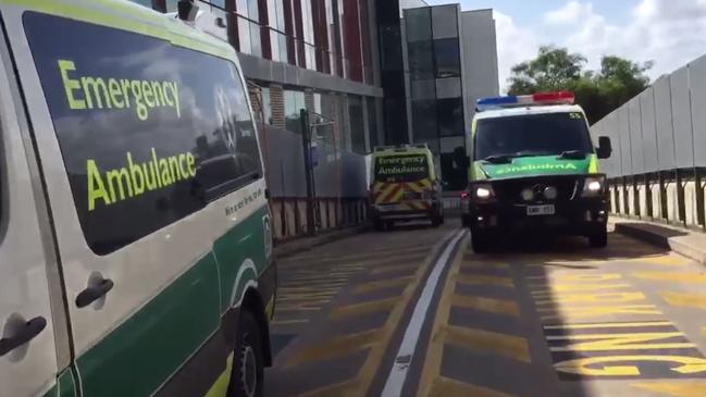 A still image from a video showing ambulances at Flinders Medical Centre emergency department on Friday.