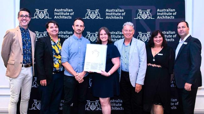 Counterpoint Architecture co-director Mark Kennedy (third from left) with Townsville City Council councillors or employees Liam Mooney, Jeffrey Kerr, Danielle Gross, Acting Mayor Paul Jacob, Vera Dirou and Andrew Robinson in Townsville. Mr Kennedy and Counterpoint Architecture won the Australian Institute of Architects Regional Project of the Year Prize, and a Commendation for Residential Architecture – Multiple Housing at the annual State Awards ceremony at Brisbane’s City Hall on Friday. Picture: Supplied