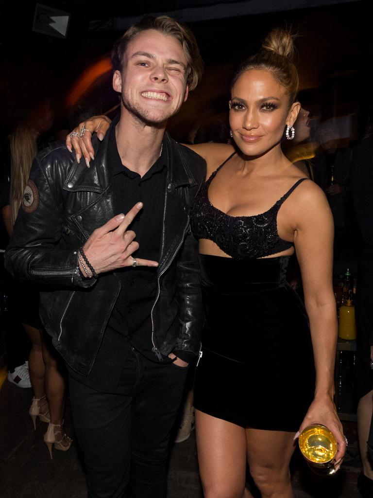 Jennifer Lopez and Ashton Irwin of 5SOS attend Jennifer Lopez’s 2015 American Music Awards After Party hosted by CIROC with Cross Pens on November 22, 2015 in Los Angeles, California. Picture: Getty