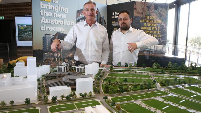 Fraser Property general manager Nigel Edgar and design director George Massoud show the first stage of the Ed. Square development. Picture: Robert Pozo