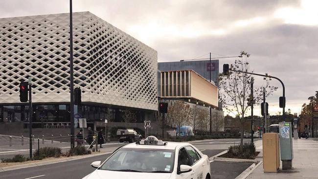 An artist's impression of Maroondah Council's new offices at Ringwood Town Square. — a bronze building between REALM and Sage Hotel. Picture: Supplied.