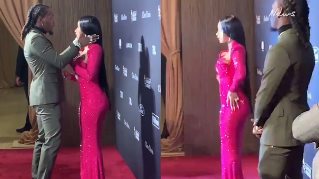 Cardi B wears a VERY revealing low-cut dress to pre-Grammy gala