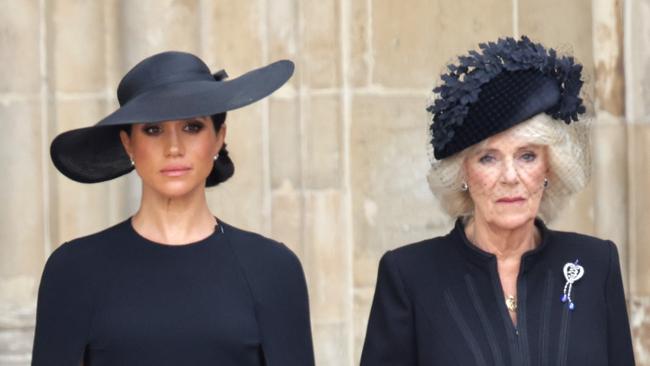 The Duchess of Sussex stands with the Queen Consort during The State Funeral Of Queen Elizabeth II at Westminster Abbey on September 19. Picture: Getty