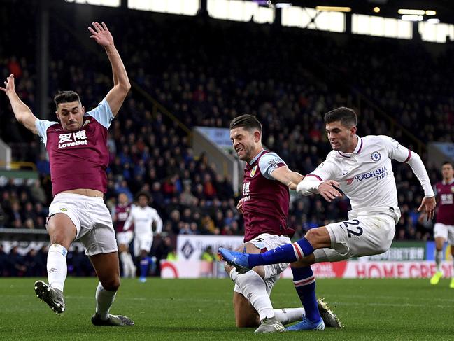 Chelsea's Christian Pulisic, right, scores his side's first goal of the game during the English Premier League soccer match at Turf Moor, Burnley, England Saturday Oct. 26, 2019. (Anthony Devlin/PA via AP)
