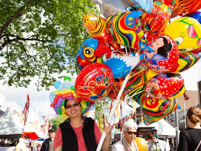 Oscar Do selling balloons at the Cabramatta Moon Festival in 2018. Picture: Jordan Shields.