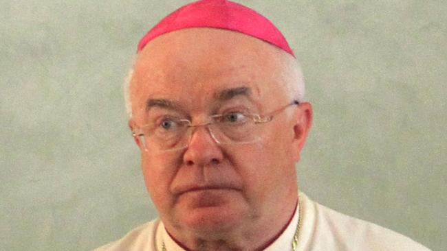 (FILES) - In this file picture former Papal Nuncio Jozef Wesolowski attend a ceremony in Santo Somingo, on August 12, 2011. Former Polish archbishop Jozef Wesolowski, who would have been the first high-ranking church official to go on trial on paedophile charges, died overnight, a Vatican source said on August 28, 2015. Wesolowski, 67, had suffered from health problems that last month caused postponement of his trial, which was to be the first against a church official under a Vatican justice system revamped by Pope Francis in response to widespread accusations of sexual abuse of children by priests. AFP PHOTO / ERIKA SANTELICES