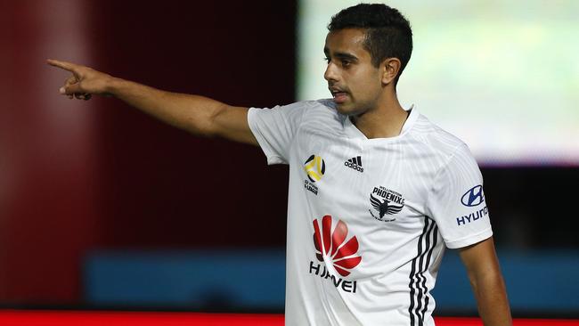 Sarpreet Singh celebrates scoring Wellington's eighth goal.