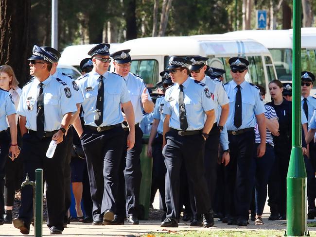 Mourners at the memorial service with full police honours for constables Rachel McCrow and Matthew Arnold at Brisbane Entertainment Centre. Picture: David Clark