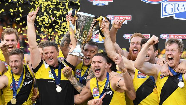 Hardwick and Richmond’s players enjoy their 2017 premiership win.