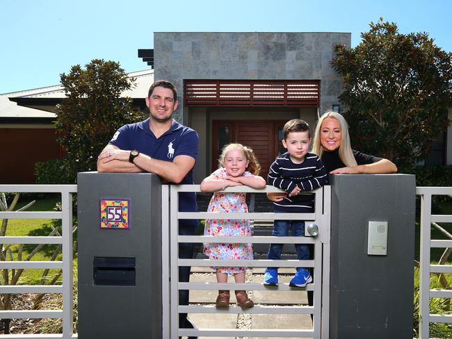 Emily and Simon Schlegel with their children Maddy (6) and Harry (4) have purchased their dream home in Manly West after reaping the rewards of their sale in Wakerley. Manly West Saturday 5th August 2023 Picture David Clark