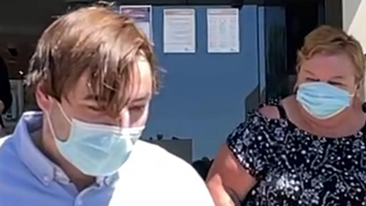 Covid-19 lockdown jumper Kieran Daniel Price-Moss leaves Toowoomba Courthouse with his mother after being fined more than $4000 for breaching Covid-19 health directions, Wednesday, 6 October 2021.