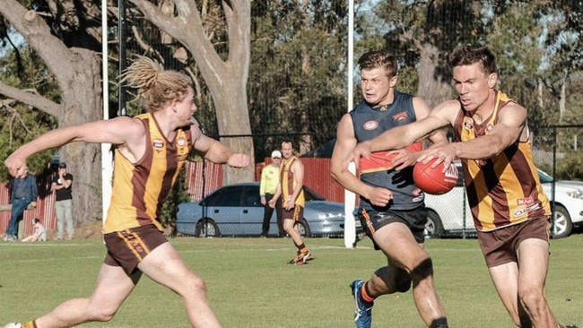 Matt Dominish (left) lays a shepherd for Langhorne Creek. Picture: Langhorne Creek Football Club