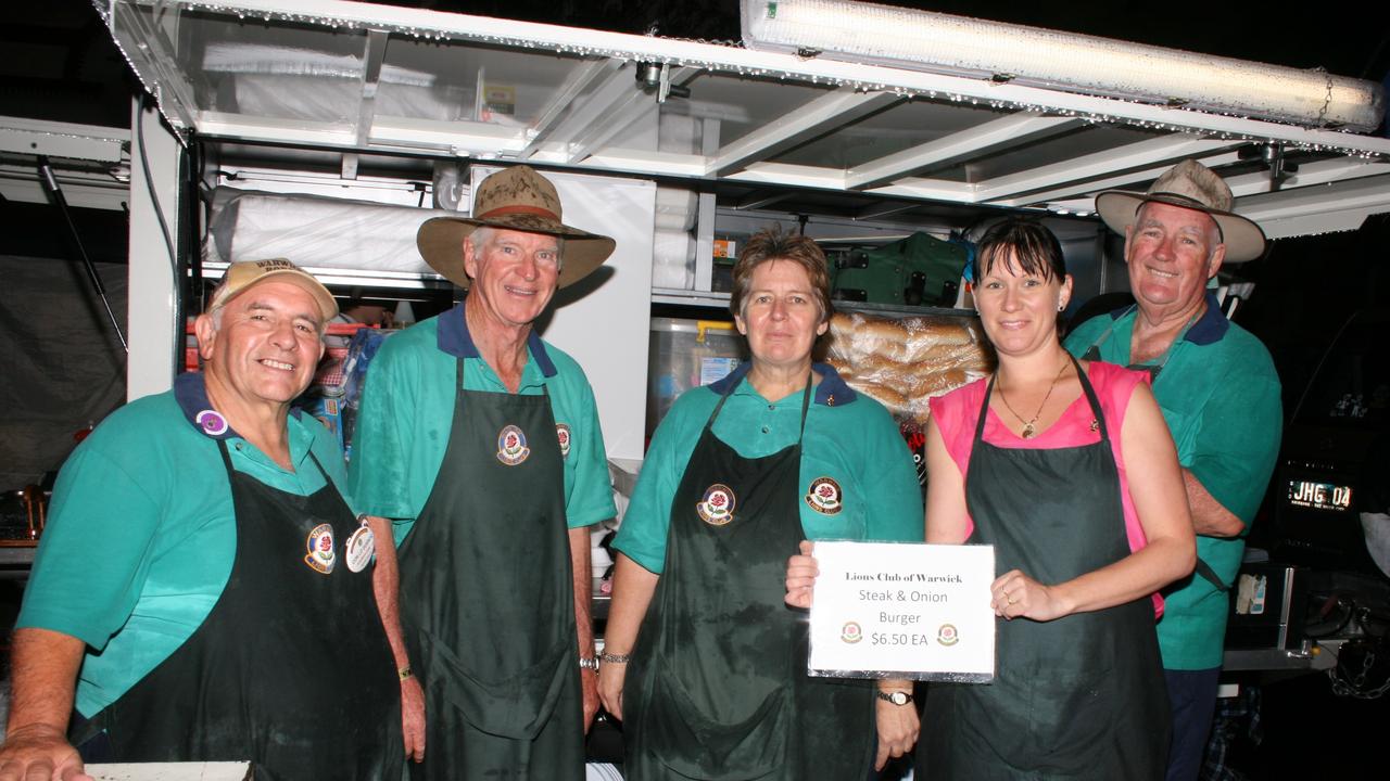 <p>Warwick Lions Con Lo Giudice, Jeff Ferguson, Jenny Rainbird and Desirea and John Griffith serve burgers at the Warwick Rodeo Mardi Gras on Friday, October 24. Photo Deanna Millard / Daily News</p>