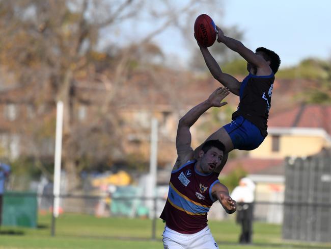 Ormond's Tonn Steele takes a great mark against Marcellin on Saturday.