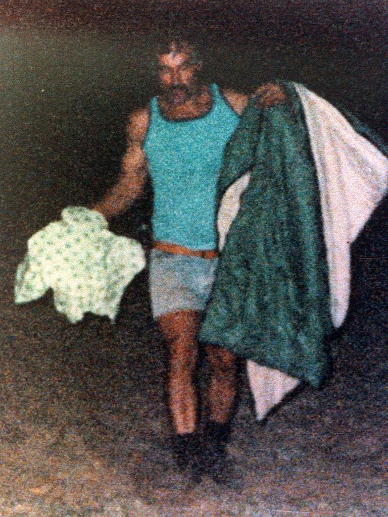 Milat with a sleeping bag belonging to one of his victims.