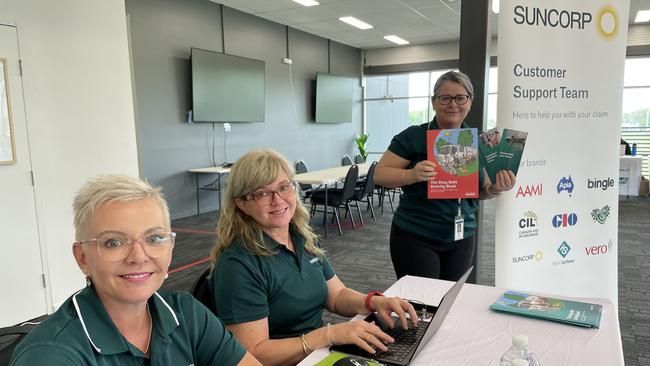 Suncorp staff members Romany Jones, Kim Borkowski and Vicki Kerby  are ready offer assistance at the Insurance Hub, established at the Townsville Sports Stadium in Annandale. Photo: Leighton Smith.