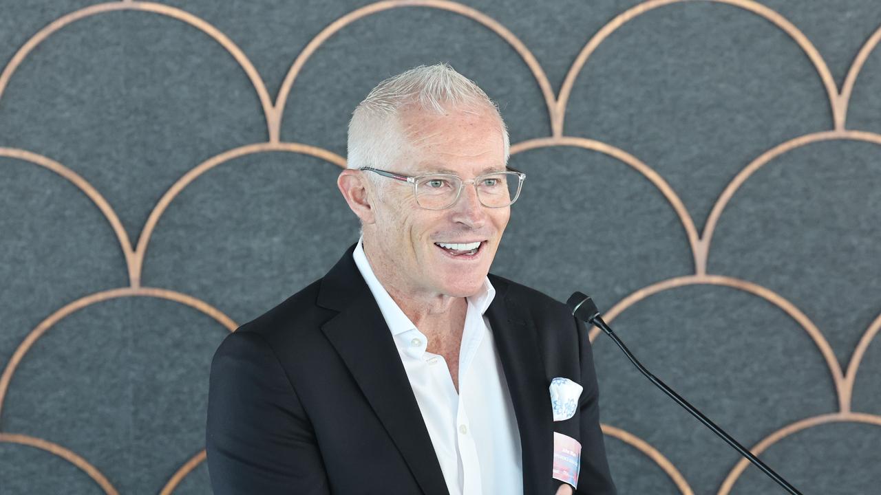 Experience Gold Coast CEO John Warn celebrating the ‘Stars of Tourism’ category sponsored by Experience Gold Coast at Skypoint up the Q1. Picture: Glenn Hampson