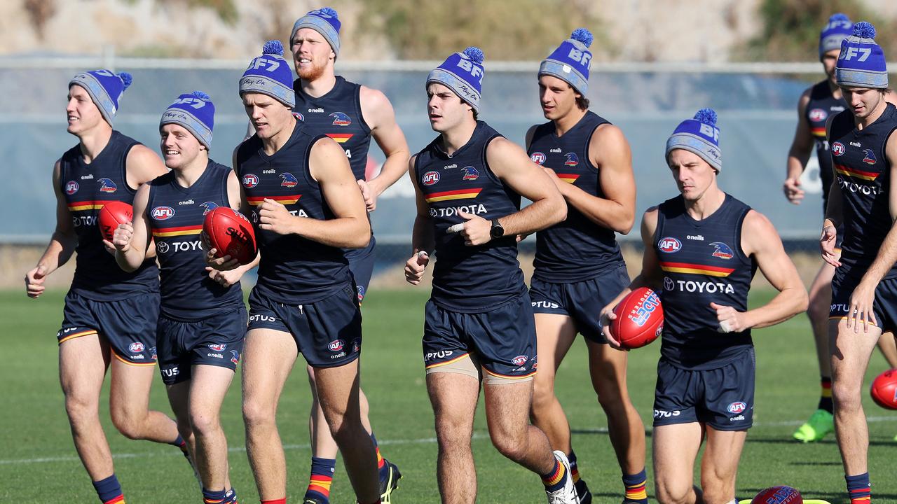 Crows players donned MND beanies as they were put through their paces on Thursday. Picture: Sarah Reed