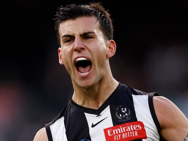 MELBOURNE, AUSTRALIA - AUG 17: Nick Daicos of the Magpies celebrates a goal during the 2024 AFL Round 23 match between the Collingwood Magpies and the Brisbane Lions at The Melbourne Cricket Ground on August 17, 2024 in Melbourne, Australia. (Photo by Michael Willson/AFL Photos via Getty Images)