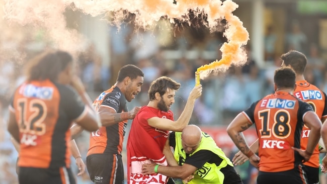 Fireproof Australia protester Andrew George was sentenced to three months imprisonment for his stunt at the West Tigers v Cronulla Sharks over the weekend. Picture: Mark Kolbe/Getty Images