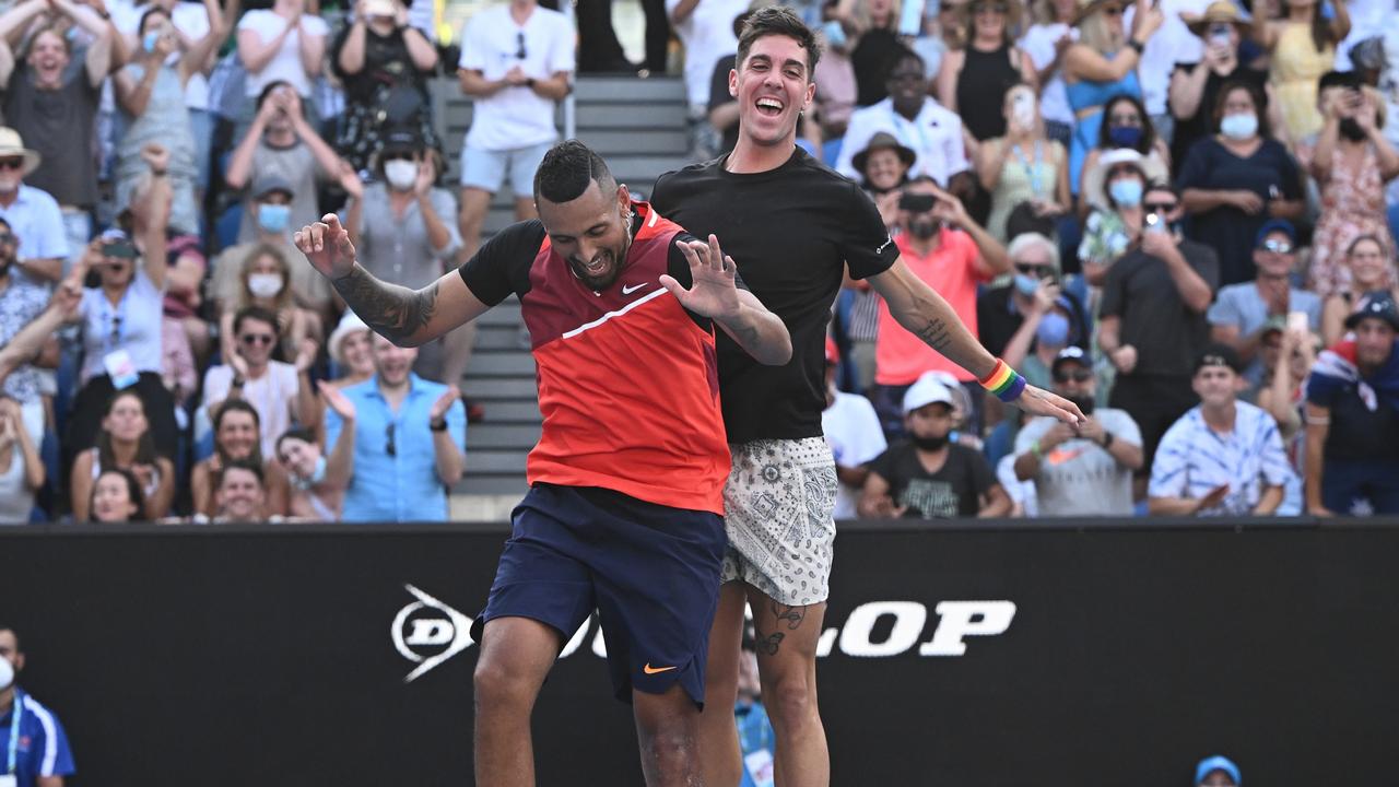 MELBOURNE, AUSTRALIA - JANUARY 23: Thanasi Kokkinakis (R) of Australia and Nick Kyrgios of Australia celebrates match point in their third round doubles match against Ariel Behar of Uruguay and Gonzalo Escobar of Ecuador during day seven of the 2022 Australian Open at Melbourne Park on January 23, 2022 in Melbourne, Australia. (Photo by Quinn Rooney/Getty Images)